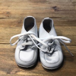 White leather baby shoes